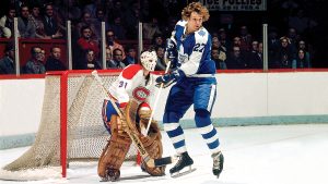 MONTREAL, QC - JANUARY 01: 1970: Darryl Sittler #27 of the Toronto Maple Leafs screens goalie Michel Larocque #31 of the Montreal Canadiens (Photo by Denis Brodeur/NHLI via Getty Images)